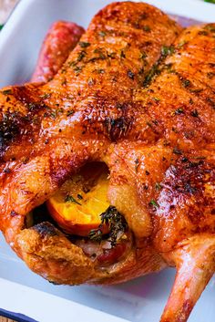 a close up of a cooked chicken in a pan