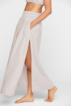 It takes two to Tambo. This crisp linen, floor-grazing maxi skirt with high slits is best worn with its matching crop top, the Matuku. We’re feeling this look for a balmy summer day adventuring on the coast or a vacation date night on the beach. Pro tip - breathable linens are ideal for a sticky subway ride in the middle of the summer. Night On The Beach, Strap Crop Top, Pro Tip, It Takes Two, Summer Day, Dress Romper, The Coast, Skirts For Sale, Swimwear Tops