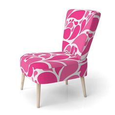 a pink and white patterned chair with wooden legs