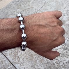 Men's big beaded balls chain bracelet. 316L stainless steel hollow ball beads. Choose 7.5" 8.5" or 9.5" inch lengths. Weighs 4 -41 grams depending on length. Real stainless steel: won't fade or tarnish. Express your bold attitude with this dope bracelet. Enjoy 100% FREE SHIPPING in USA. Order now! Sterling Silver Bracelets With Ball Chain And Round Beads, Elegant Sterling Silver Ball Chain Bracelets, Silver Ball Bracelet, Adjustable Sterling Silver Ball Chain Bracelet, Hip Hop Chains, Big Balls, Ball Bracelet, Ring Watch, Pendant Rings