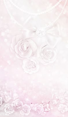 a pink background with white roses and pearls