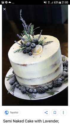 a white cake sitting on top of a wooden table