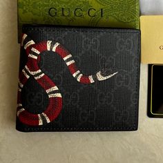 Ships Within 9-12 Days Brand New Gucci Leather Black Bifold Wallet 2 Bill Compartments 8 Credit Cards Pouches Dimension 4.3” X 3.8” Folded If You Need This Classic Leather Wallet Urgently, Please Do Not Buy It Because The Delivery Time For This Is 9-12 Days Gucci Leather Wallet For Business, Gucci Leather Business Wallet, Gucci Men Bag, Gucci Bifold Wallet With Coin Pocket, Gucci Leather Wallets With Rfid Blocking, Gucci Leather Wallet With Rfid Blocking, Designer Black Leather Wallet, Designer Gucci Wallet With Coin Pocket, Designer Gucci Wallet With Rfid Blocking