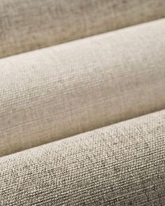 a close up view of the fabric on a bed sheet that has been made to look like linen