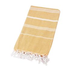 a yellow and white towel with tassels hanging from it's side on a white background