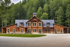 a large house in the middle of a wooded area with lots of trees around it