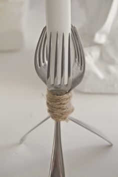 a fork with a rope wrapped around it