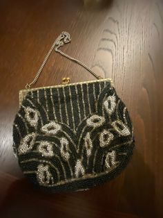 Lovely little beaded purse for evening wear. In great vintage condition with stain inside that does nor affect outside. It is 5 by 5 inches with 12 inch chain. Antique Beaded Evening Bag, Antique Beaded Evening Bag For Party, Antique Beaded Evening Bag For Formal Events, Vintage Black Beaded Evening Bag, Vintage Beaded Evening Bag As Gift, Vintage Evening Bag With Gold Beads, Port Huron, Micro Beads, Owl Necklace