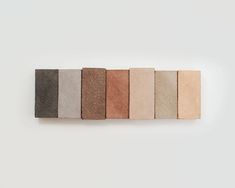 five different colors of concrete on a white background