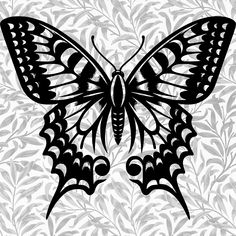 a black and white butterfly on a floral background