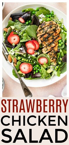 strawberry chicken salad on a white plate with silverware