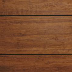 a close up view of the wood grains on this flooring material that is brown