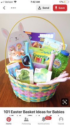 a basket filled with children's toys on top of a wooden table