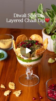 a bowl filled with food sitting on top of a wooden table