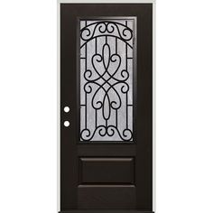 a black door with a glass panel and wrought iron grills on the front side