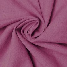 a close up view of a purple fabric