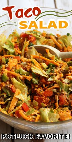 a bowl filled with lots of food on top of a wooden table