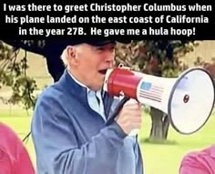 a man holding a red and white megaphone in front of his face with the caption, i was there to greet christopher