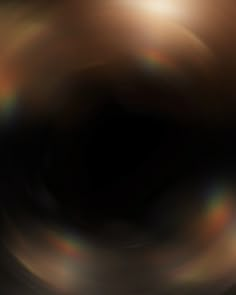 a blurry image of an object in the middle of it's light source