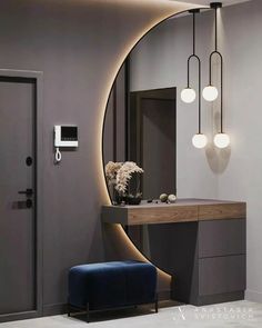 an image of a room with a mirror and lights on the wall in front of it