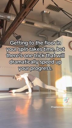 a woman doing yoga on the floor with a quote about getting to the floor in your split takes time, but there's one trick that will dramatically speed up your progress