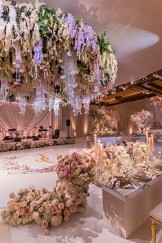 an elegant wedding setup with flowers and candles