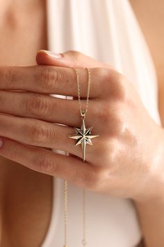 Minimalist Yellow Gold Jewelry With Star Charm, 14k Gold Celestial Star Of David Jewelry, Celestial Star-shaped Jewelry With Compass Design, Rose Gold 14k Gold Star Jewelry, 14k Gold Starburst Celestial Jewelry, Celestial Yellow Gold Jewelry With Compass Design, 14k Gold Star Charm Jewelry Gift, 14k Gold Jewelry With Star Charm Gift, 14k Gold Star-shaped Fine Jewelry