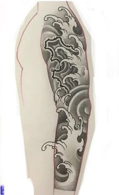 an arm tattoo with black and white designs on it's side, in the shape of waves