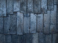 an image of a wooden wall that looks like it is made out of wood planks