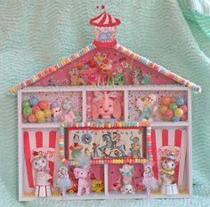 a doll house with lots of toys in it