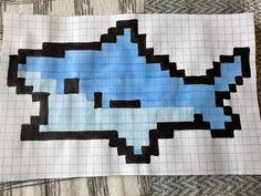 a piece of paper that has been made to look like an image of a shark