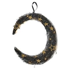 a wreath with gold stars hanging from it