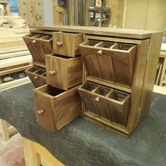 several wooden drawers stacked on top of each other