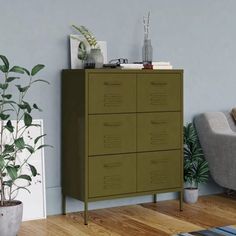 a living room with a couch and a cabinet