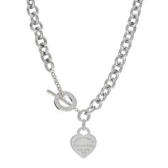 This is an authentic TIFFANY Sterling Silver Return to Tiffany Heart Tag Toggle Necklace. The necklace is crafted of sterling silver and features a heart tag charm engraved with the signature 'Please Return to Tiffany & Co' logo. 1426085 Heart Tag Toggle Necklace, Return To Tiffany, Tiffany Necklace, Toggle Necklace, Tiffany Jewelry, The Necklace