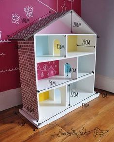 the doll house is made out of cardboard and has three levels to fit into it