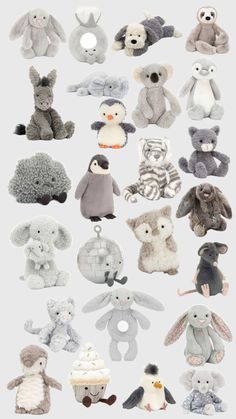 many different stuffed animals are arranged together