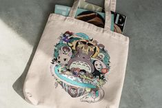 a tote bag that has pictures on it