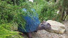 blue ceramic snail tucked into green garden Ceramic Garden Art, Garden Snail, Outdoor Hot Tub, Snails In Garden