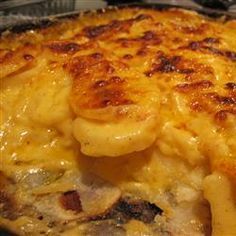 a casserole dish with meat and cheese on it is ready to be eaten