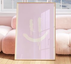 a pink room with an open window and a smiley face drawn on the wall in front of it