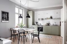 the kitchen is clean and ready to be used as a dining room or living room