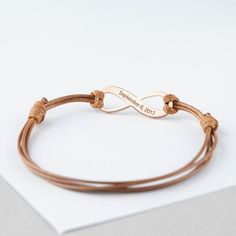 ♥ LEATHER INFINITY COORDINATES BRACELET ♥• Material: Solid 925 Sterling Silver • Finishing: Silver - Yellow Gold - Rose Gold • Word limits: 3-4 wordsH O W • T O • O R D E R1. Select your preferred CHARM COLOR and 1 SIDE / 2 SIDES ENGRAVING from the menu. 2. Select your preferred LEATHER COLOR from the menu.3. Please let us know the coordinates or messages in the "Note to GRSJewelry" section during checkout. If you don't know the exact coordinates, leave us the address and we will look up the coo Elegant Adjustable Wrap Bracelet Gift, Elegant Adjustable Wrap Bracelet For Gift, Brown Braided Bangle Bracelets As Gift, Brown Braided Bangle Bracelet For Gift, Brown Braided Bracelet For Gifts, Personalized Elegant Leather Bracelet As Gift, Personalized Elegant Leather Bracelet Gift, Elegant Personalized Leather Bracelet Gift, Elegant Personalized Leather Bracelet For Gift