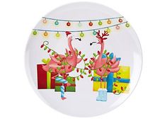 two pink flamingos with presents on a white plate