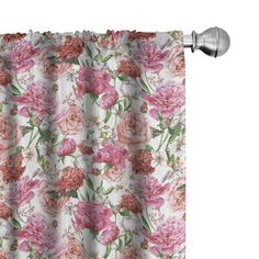 a curtain with pink and red flowers on it, in front of a white background