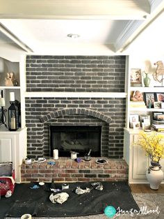 a living room filled with furniture and a fire place