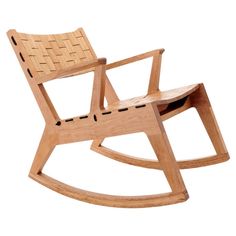 a wooden rocking chair on a white background