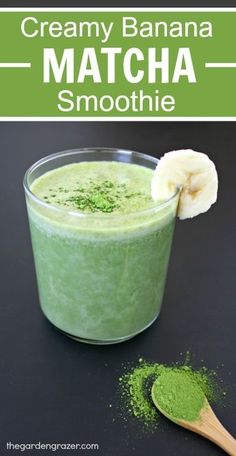 creamy banana matcha smoothie in a glass with a wooden spoon on the side