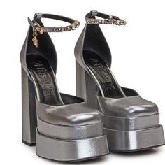 100% Authentic Guaranteed Allow 5 Days Handling Time Grey Satin Pump. Ankle Strap With Crystals. Medusa Pendant. Square Toe. High Heel. Double Platform. Outside: 100% Fabriclining: 100% Leathersole: 100% Leather Heel Height: 5,91plateau Height: 2,36 Versace Medusa Platform Heels White, Grey Platform Heels, Luxury Metallic Leather Heels, Luxury Metallic Round Toe Heels, Luxury Metallic Heels With Round Toe, Luxury Metallic Closed Toe Heels, Silver Metallic Leather Heels For Evening, Luxury Metallic Heels For Gala, Luxury Silver Heels With Metal Feet