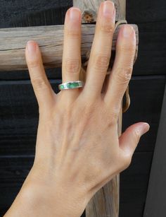 Perfect for stacking or wearing alone, this sleek, gorgeous ring is handcrafted with Sterling Silver and features unique green blue Sonoran Gold Turquoise inlaid stones. This ring has all the same precision and delicacy that the Navajo silversmiths are known for.  We currently have a matching bracelet, see here: https://highway66treasures.etsy.com/listing/1658148971 Choose your size at checkout (Sizes 7, 7.5, 8.5, 9.5) Width: 1/4" 4 grams Stamped: Sterling Artist Stamped: AT  Thank you for shopping with Highway 66 Treasures! 😊 Please note: Most items are vintage. I clean and polish every item I ship due to concerns about germs etc... If you want your purchase left "as is" let me know before shipment. Keep in mind, that means fingerprints etc. In my opinion it's better to polish and if you Unique Green Stackable Promise Rings, Elegant Green Rings With Inlay, Elegant Green Inlay Rings, Elegant Green Jewelry With Inlay, Green Sterling Silver Stackable Jewelry, Green Inlay Rings For Anniversary, Green Round Inlay Jewelry, Green Anniversary Rings With Inlay, Untreated Green Promise Ring